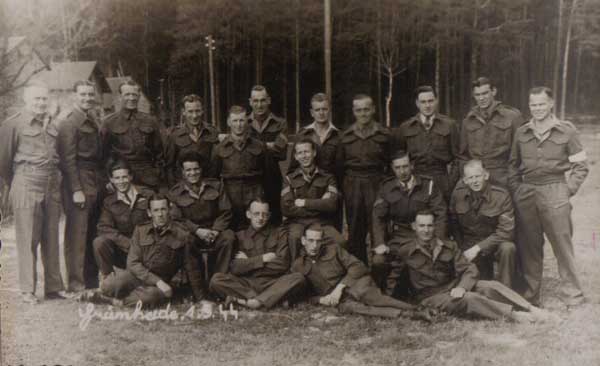 In this photograph, sent in by Malcolm Bowsher in which his father also appears on the middle row far right.  My father is on the same row on the far left.