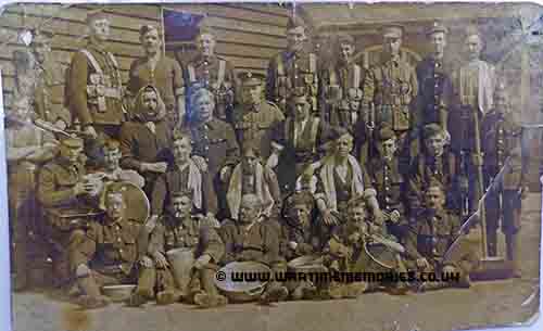 Arthur Higginson front row 4th from left.