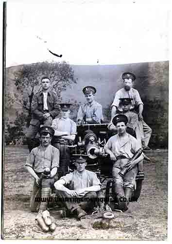 Joseph Harold Wilson - Back row on the left sitting on the wheel of an 18 Pounder Field Gun
