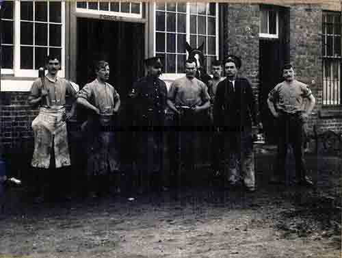Joseph Harold Wilson - Second from the right holding paint tin.
