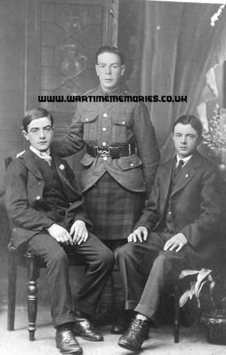 <p>Private Jim Lamb with two unidentified friends