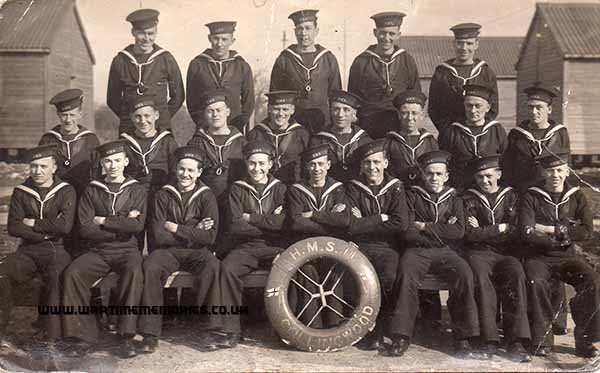 My Father is front Row 4th from the Left or at 11 oclock position in this photo of Collingwood's Life Bouy on Unit Training Station Group Photo which maybe from April to June 1943 before joining HMS Kildwick.