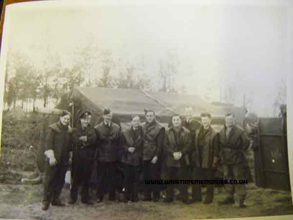 Eric Harrison with his men in Tiercelet, France in 1944 
