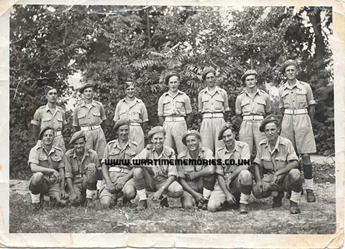L to R. Back row Cpl Smith, Ptes Paver, Young, Kleeman, Healy, Leadbetter and Sgt Bray. Front row. Sgt. Saunders, Ptes Liddicott,
Fillingham, Lt. Briscoe (S. African), Ptes Burnett,  Lamming, Dyke.