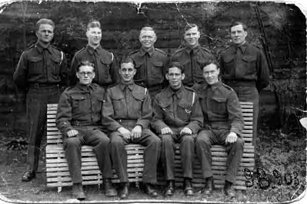 This was a real Propaganda photo taken in Stalag XXA in 1943. The POW's worked in the camp laundry and were  allowed to wash their uniforms and clothes anytime and could have a hot bath after work. My father Donald (Cocker) Cargill is middle back row.