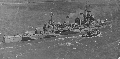 Taken as HMS Nigeria was leaving Charleston Navy Yard after repairs of torpedo damage, July 1943